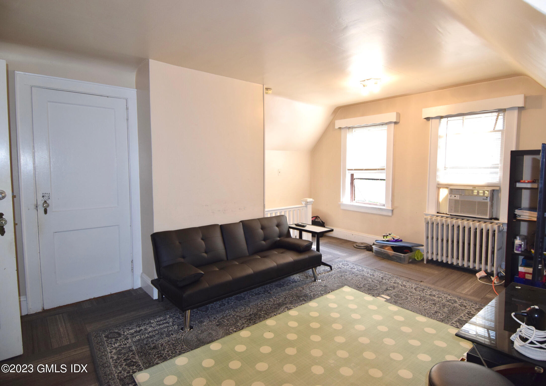 6 Pemberwick Road Greenwich, CT 06831 - Photo 24 of 32 a living room with furniture and a window