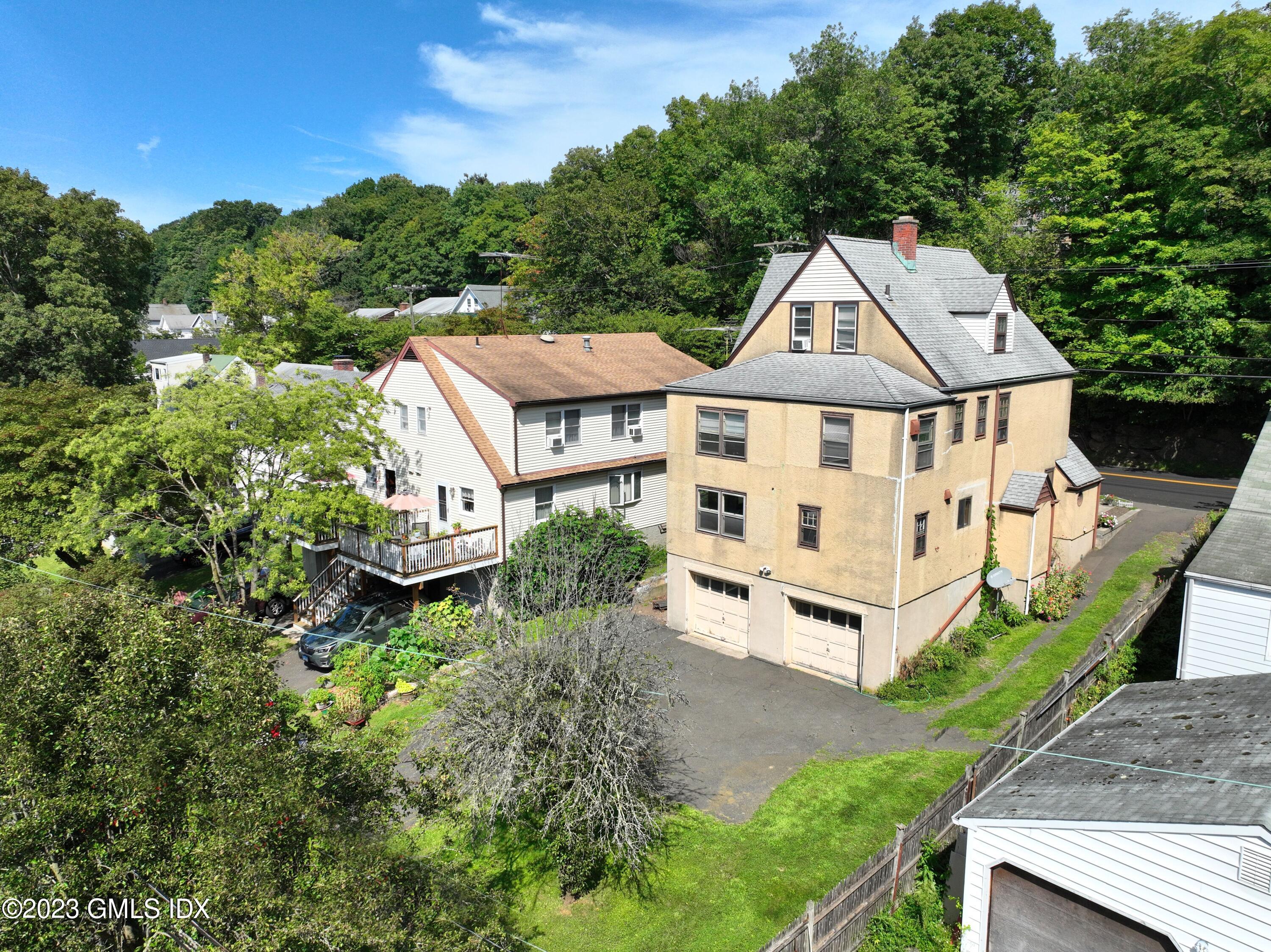 6 Pemberwick Road Greenwich, CT 06831 - Photo 25 of 32 an aerial view of a house with balcony