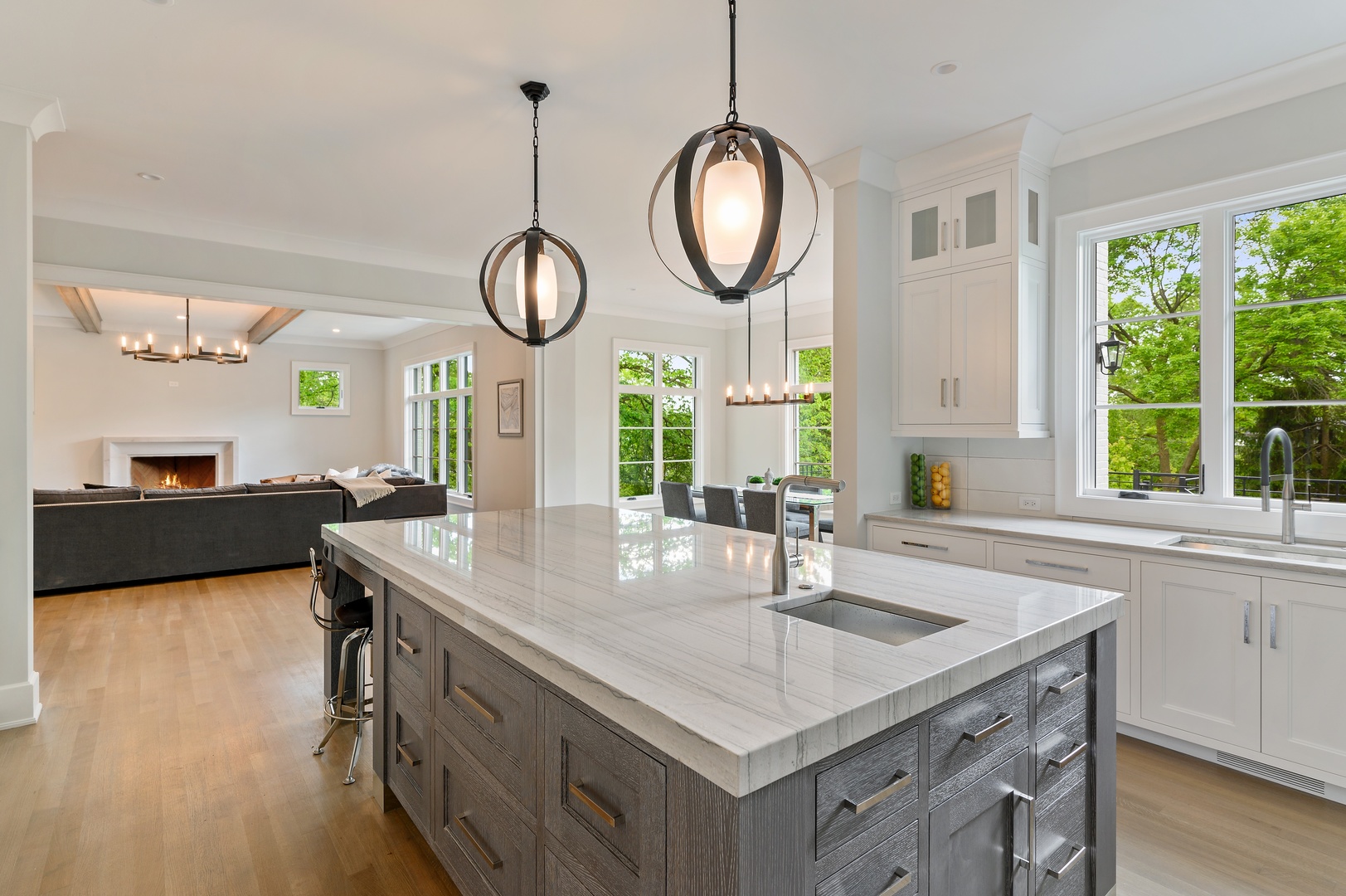 854 Bluff Street Glencoe, IL 60022 - Photo 11 of 37 a kitchen with a table chairs and a large window
