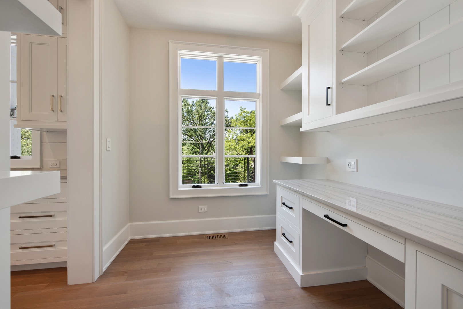 854 Bluff Street Glencoe, IL 60022 - Photo 12 of 37 a view of cabinets and window