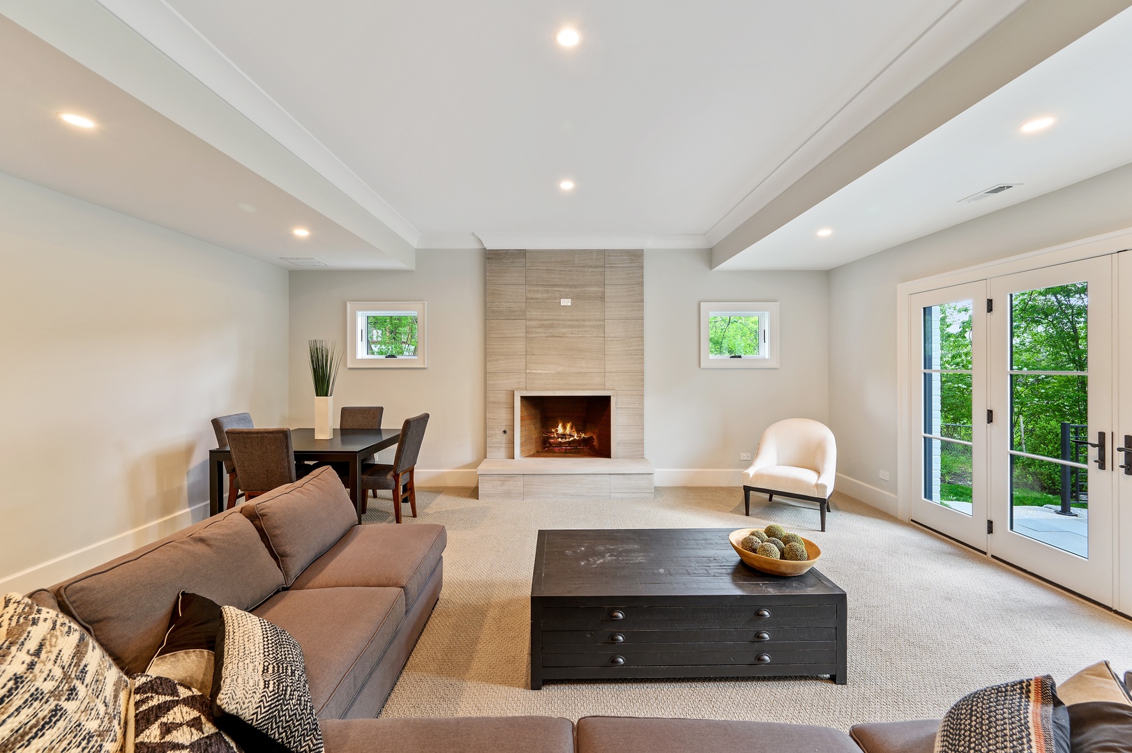 854 Bluff Street Glencoe, IL 60022 - Photo 25 of 37 a living room with furniture and a fireplace