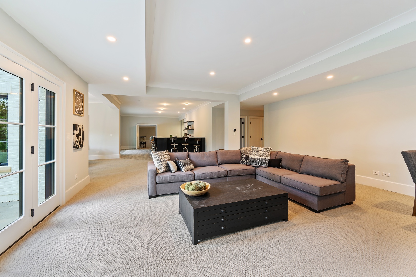 854 Bluff Street Glencoe, IL 60022 - Photo 26 of 37 a living room with furniture and a large window