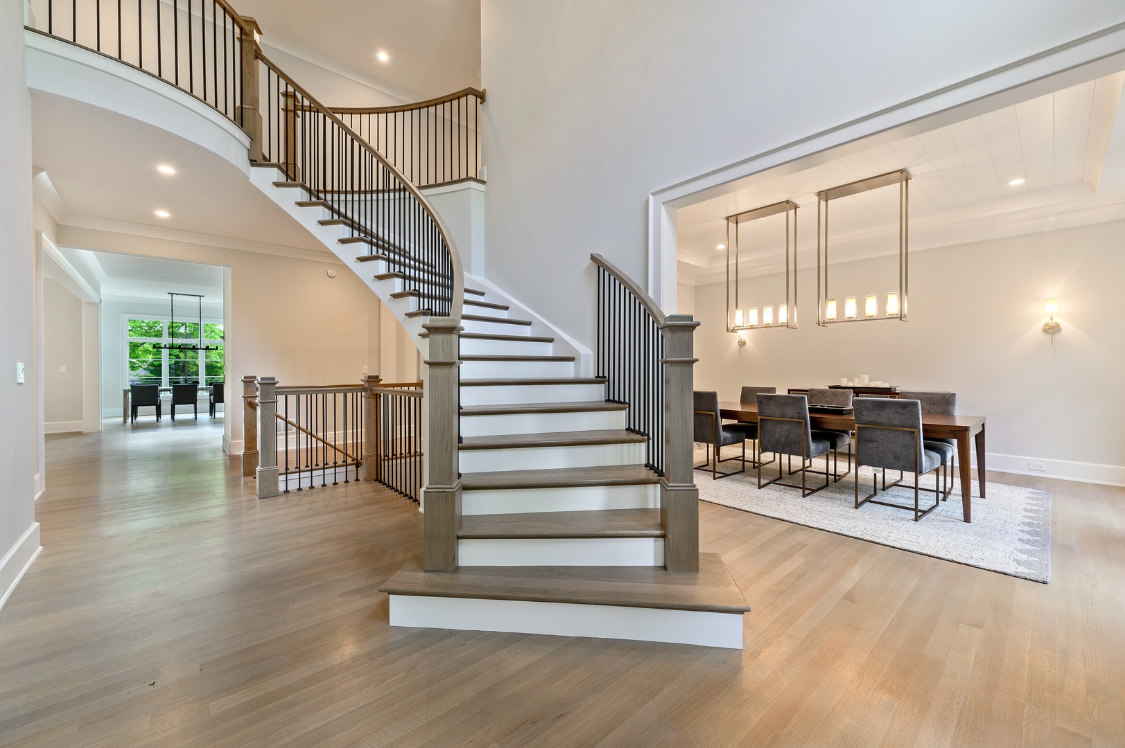 854 Bluff Street Glencoe, IL 60022 - Photo 4 of 37 a view of entryway and dining room with wooden floor