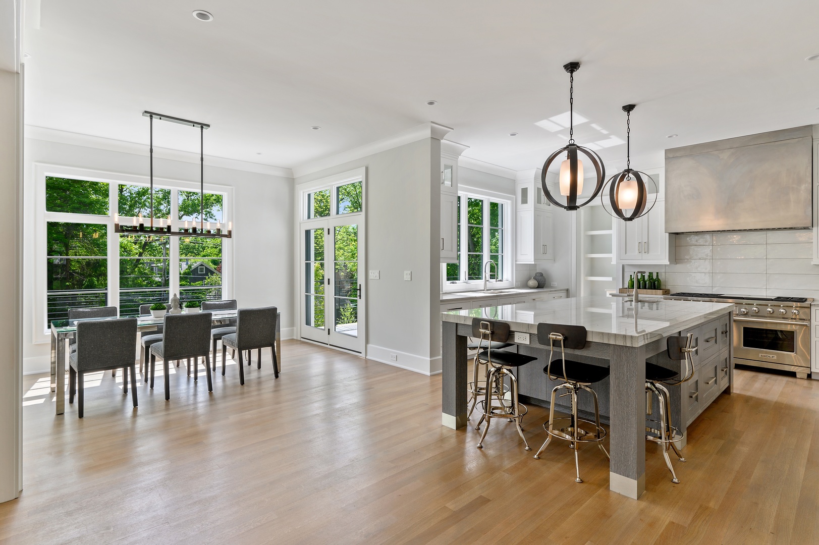 854 Bluff Street Glencoe, IL 60022 - Photo 7 of 37 a view of a dining room with furniture window and wooden floor