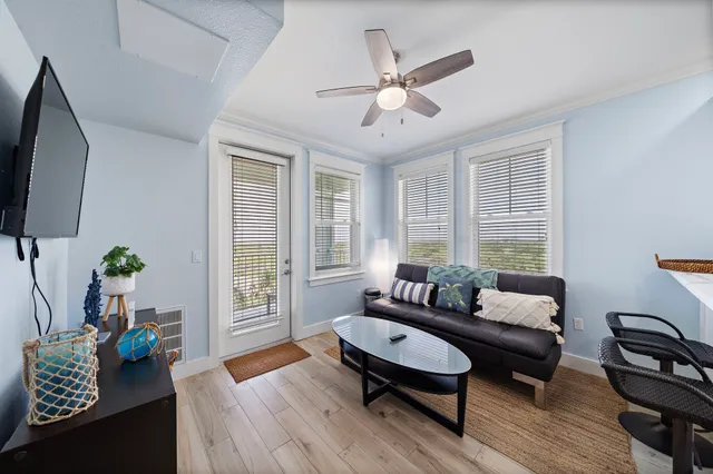 a living room with furniture and a window