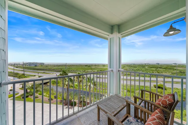 a view of a balcony with lake view and mountain view