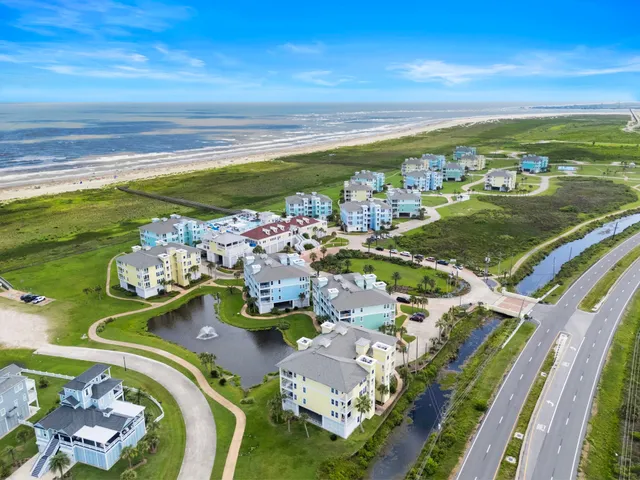 a view of a city with an ocean