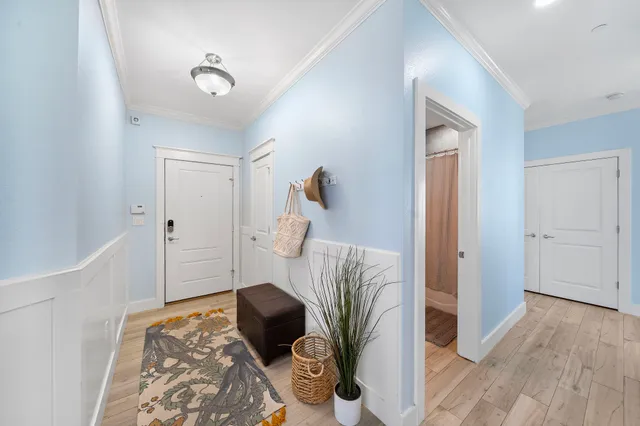 a living room with furniture and a rug