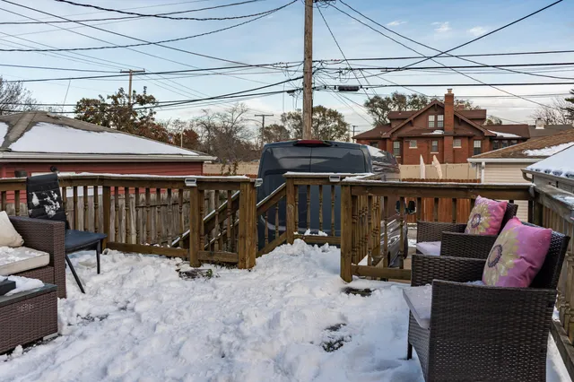 a view of a chairs and table in a patio