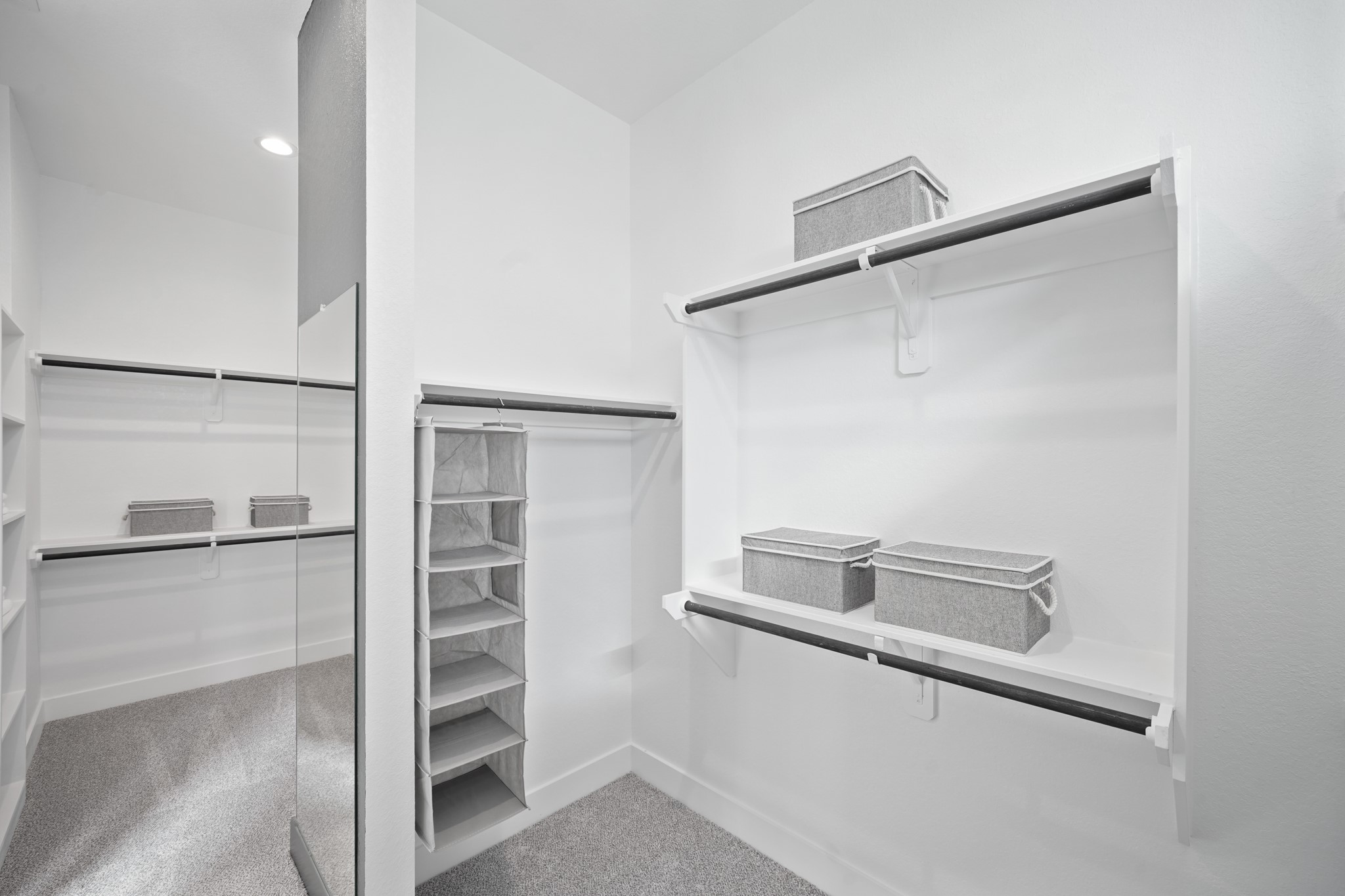 15743 Hoptree Hts Lane Conroe, TX 77302 - Photo 13 of 36 a view of walk in closet with empty racks