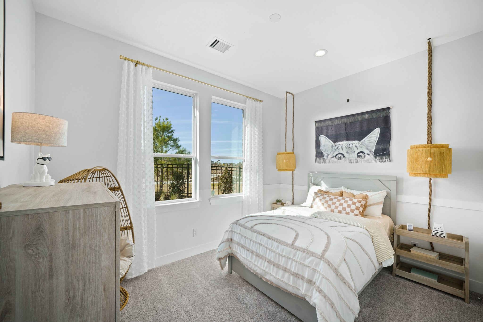 15743 Hoptree Hts Lane Conroe, TX 77302 - Photo 16 of 36 a bedroom with a bed and a window