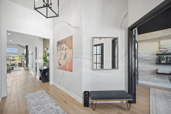 a view of a livingroom with furniture and windows