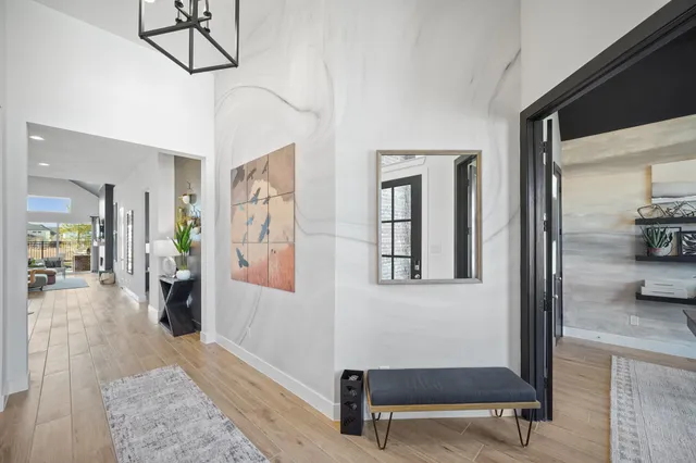 a view of a livingroom with furniture and windows