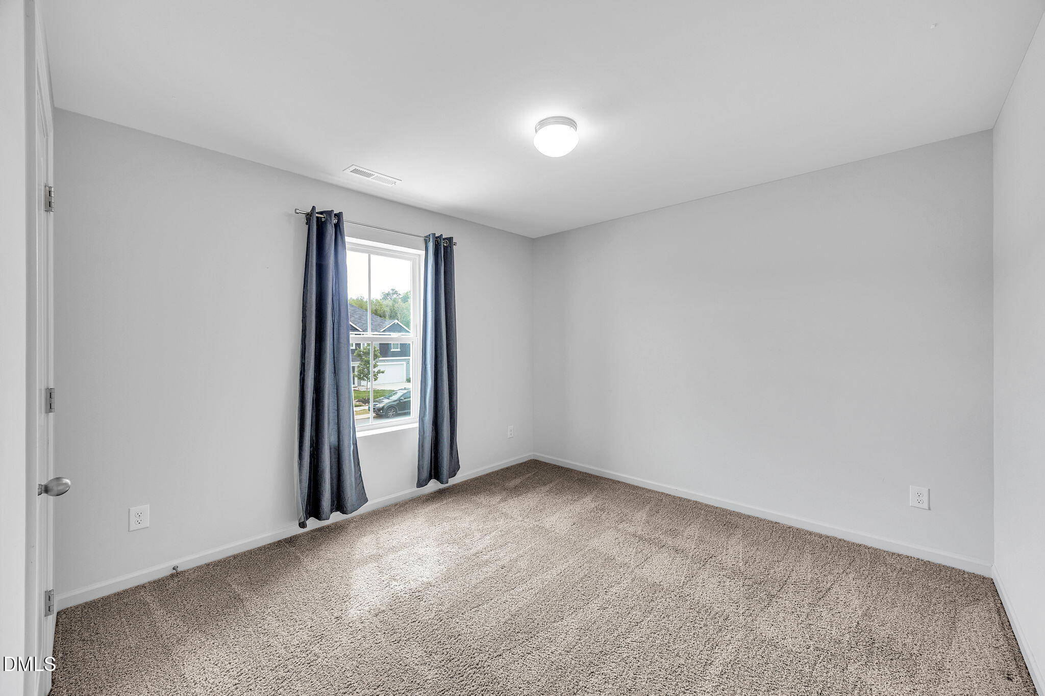 177 Yellowwood Avenue Spring Hope, NC 27882 - Photo 23 of 31 an empty room with windows