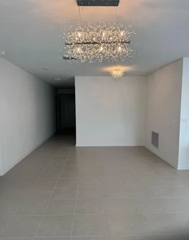 view of a big room with a fireplace