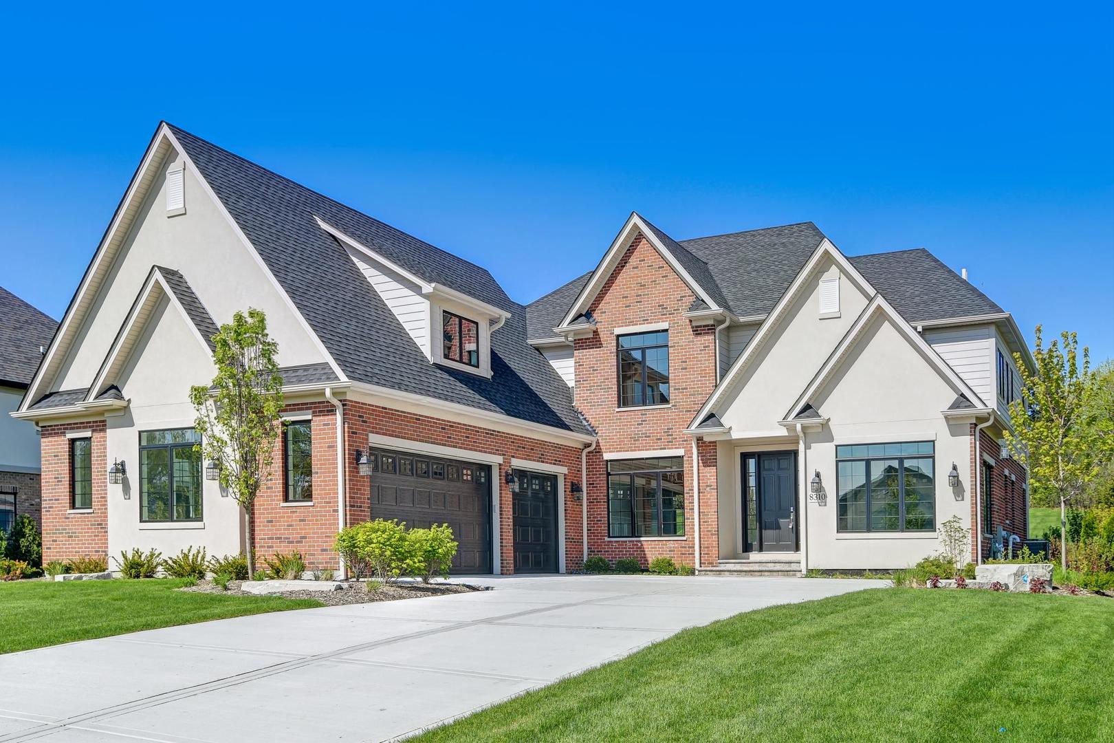 8310 Waterview Drive Burr Ridge, IL 60527 - Photo 2 of 35 front view of a house with a yard