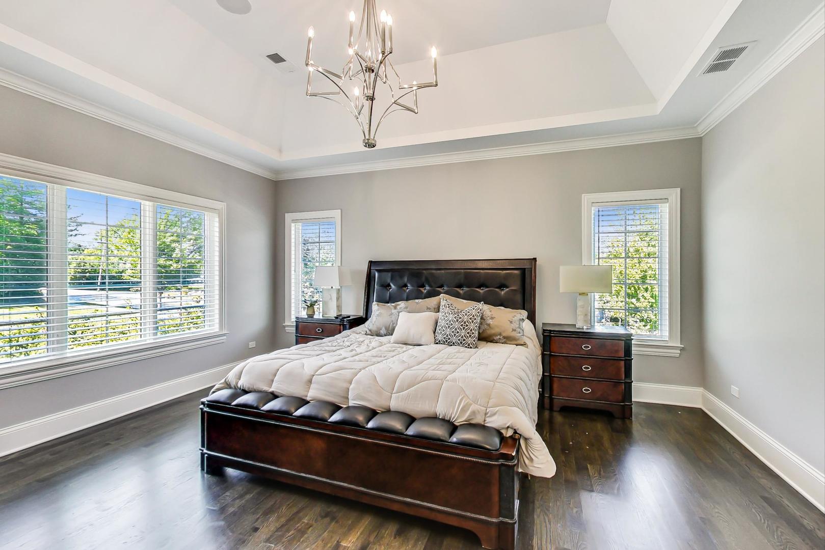 8310 Waterview Drive Burr Ridge, IL 60527 - Photo 14 of 35 a bedroom with a bed and a window