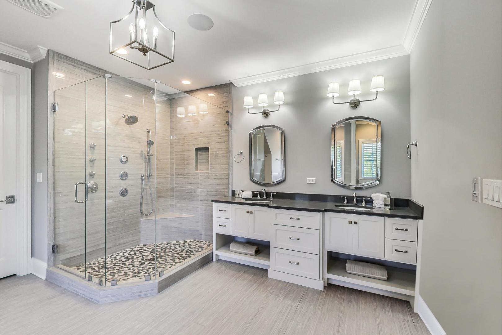 8310 Waterview Drive Burr Ridge, IL 60527 - Photo 15 of 35 a bathroom with double vanity sink and a shower