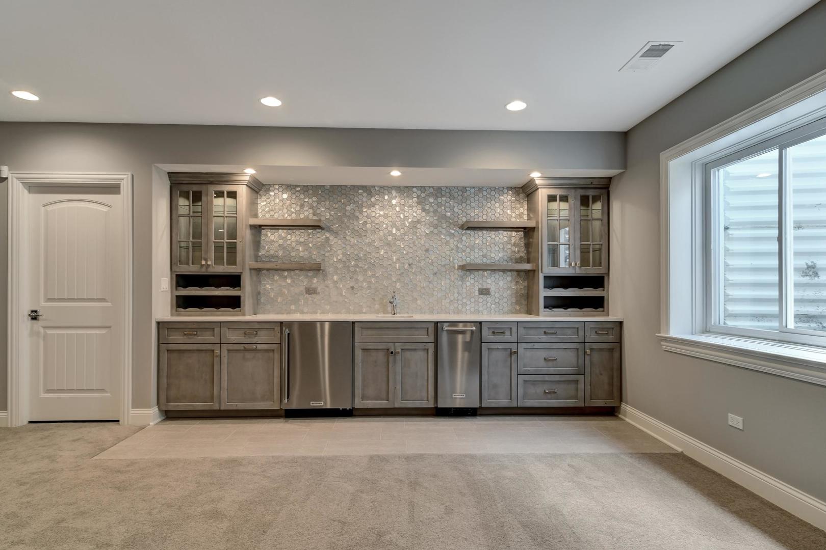 8310 Waterview Drive Burr Ridge, IL 60527 - Photo 23 of 35 a large kitchen with a large window