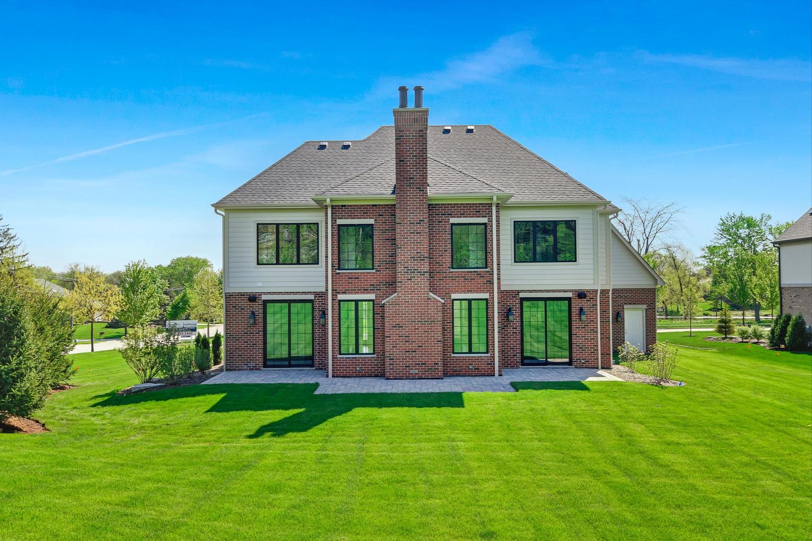8310 Waterview Drive Burr Ridge, IL 60527 - Photo 28 of 35 front view of a house with a yard
