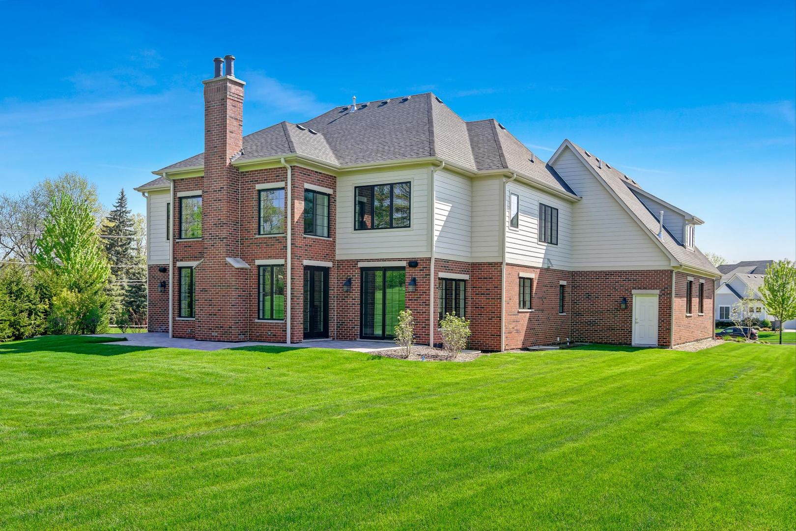 8310 Waterview Drive Burr Ridge, IL 60527 - Photo 29 of 35 a front view of house with yard