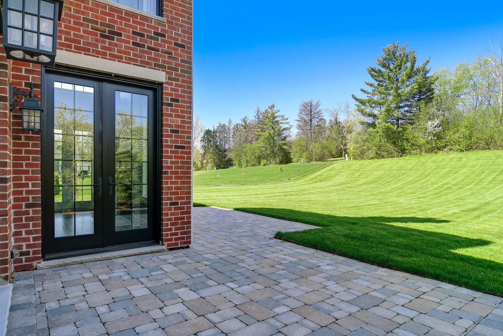 8310 Waterview Drive Burr Ridge, IL 60527 - Photo 31 of 35 a view of a building with a yard