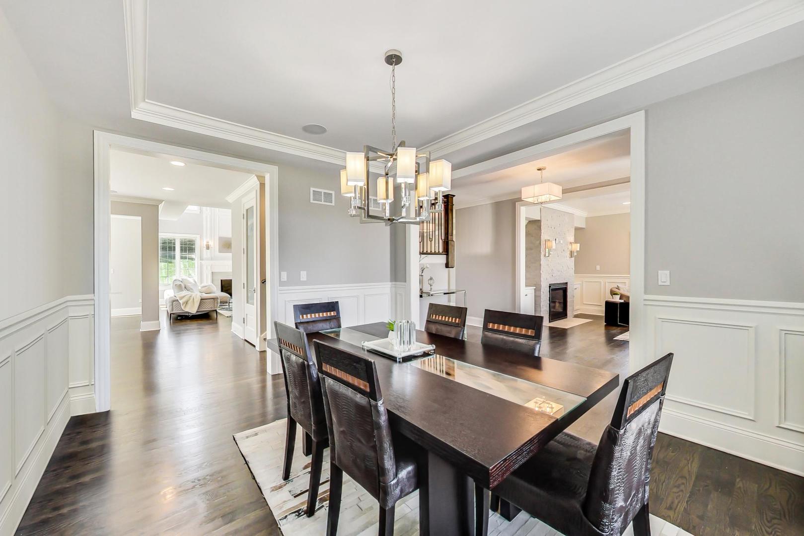 8310 Waterview Drive Burr Ridge, IL 60527 - Photo 5 of 35 a view of a dining room with furniture and wooden floor