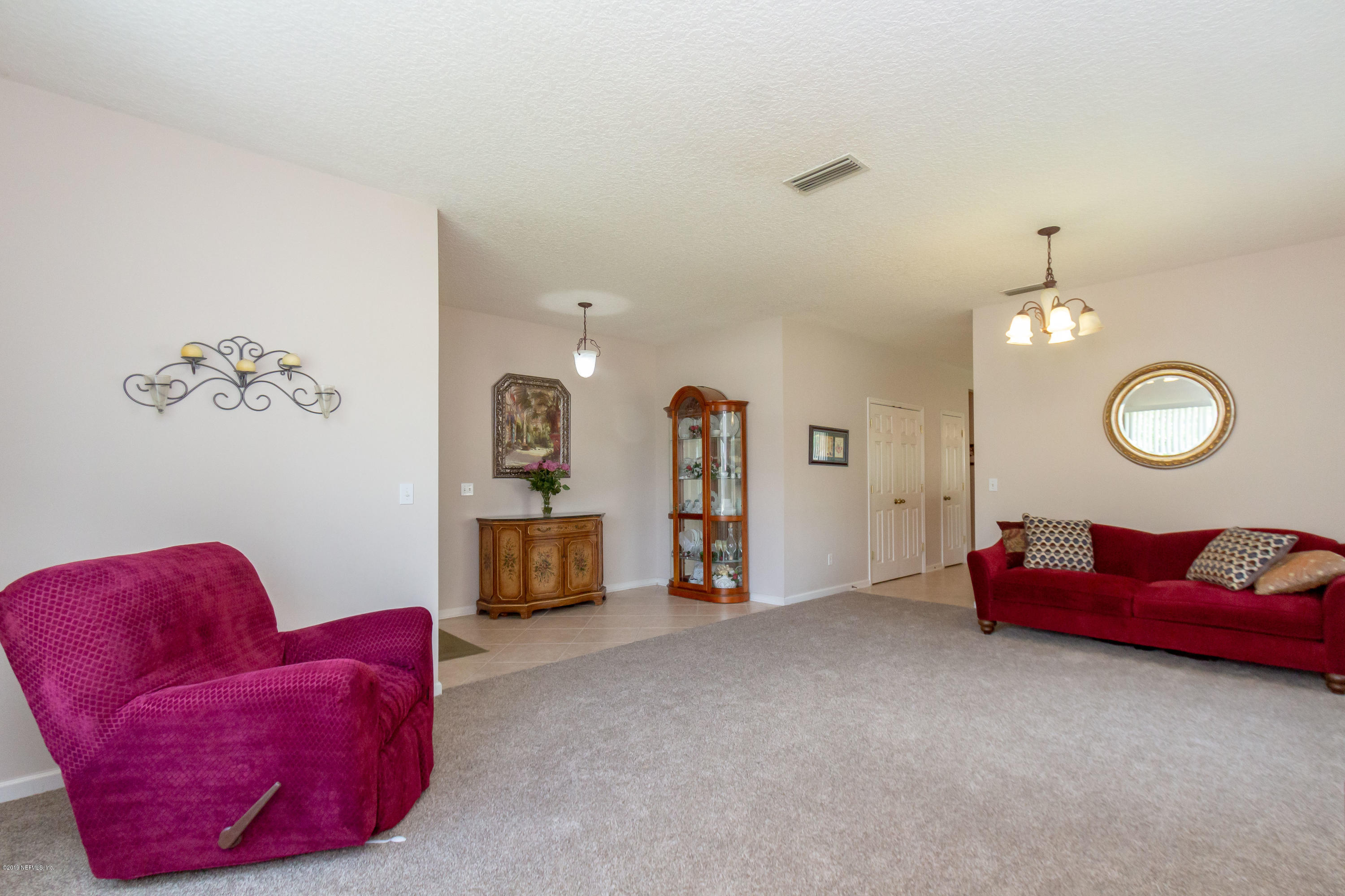 321 Stonehurst Parkway St. Augustine, FL 32092 - Photo 13 of 60 a living room with furniture