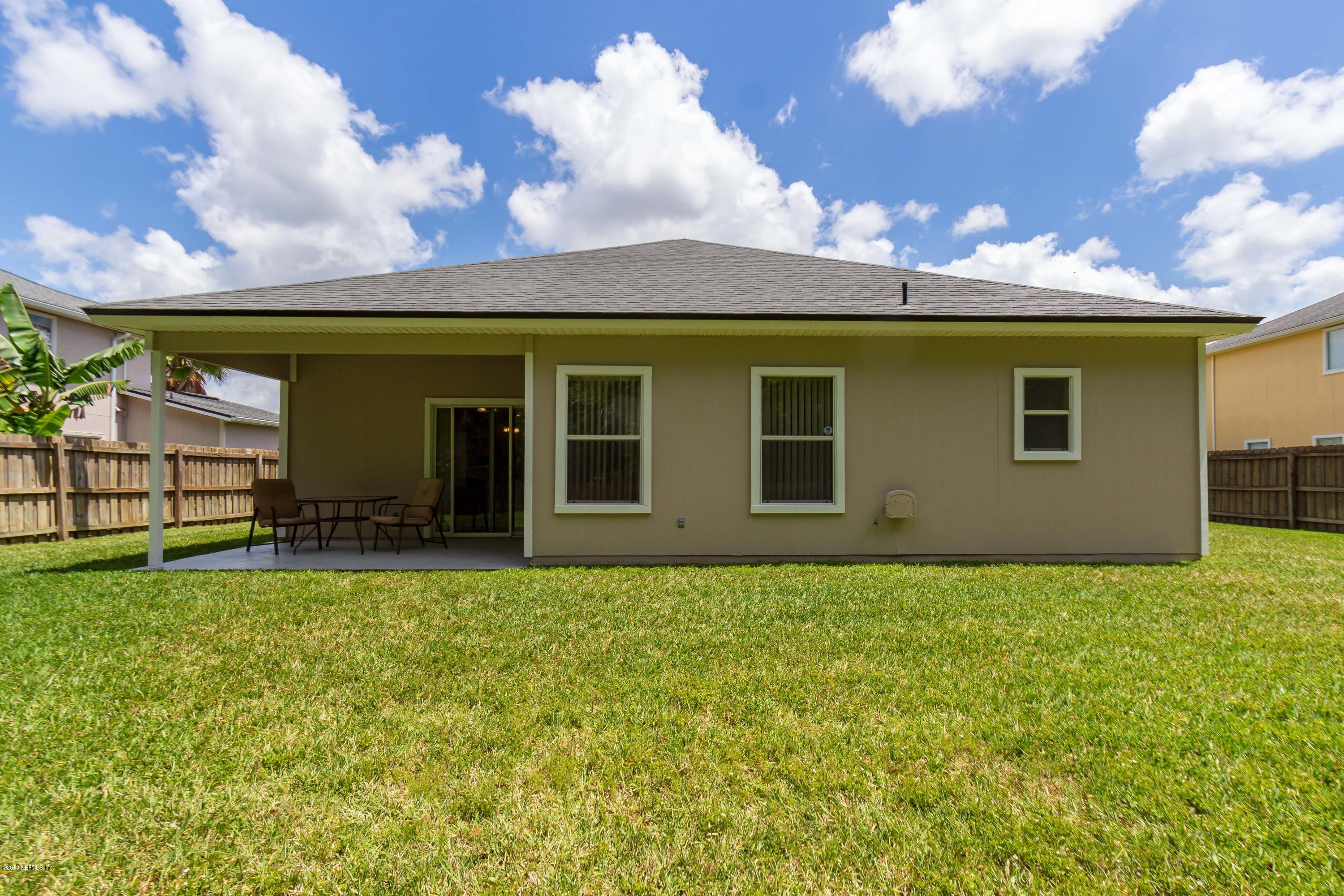 321 Stonehurst Parkway St. Augustine, FL 32092 - Photo 2 of 60 a view of a house with a yard