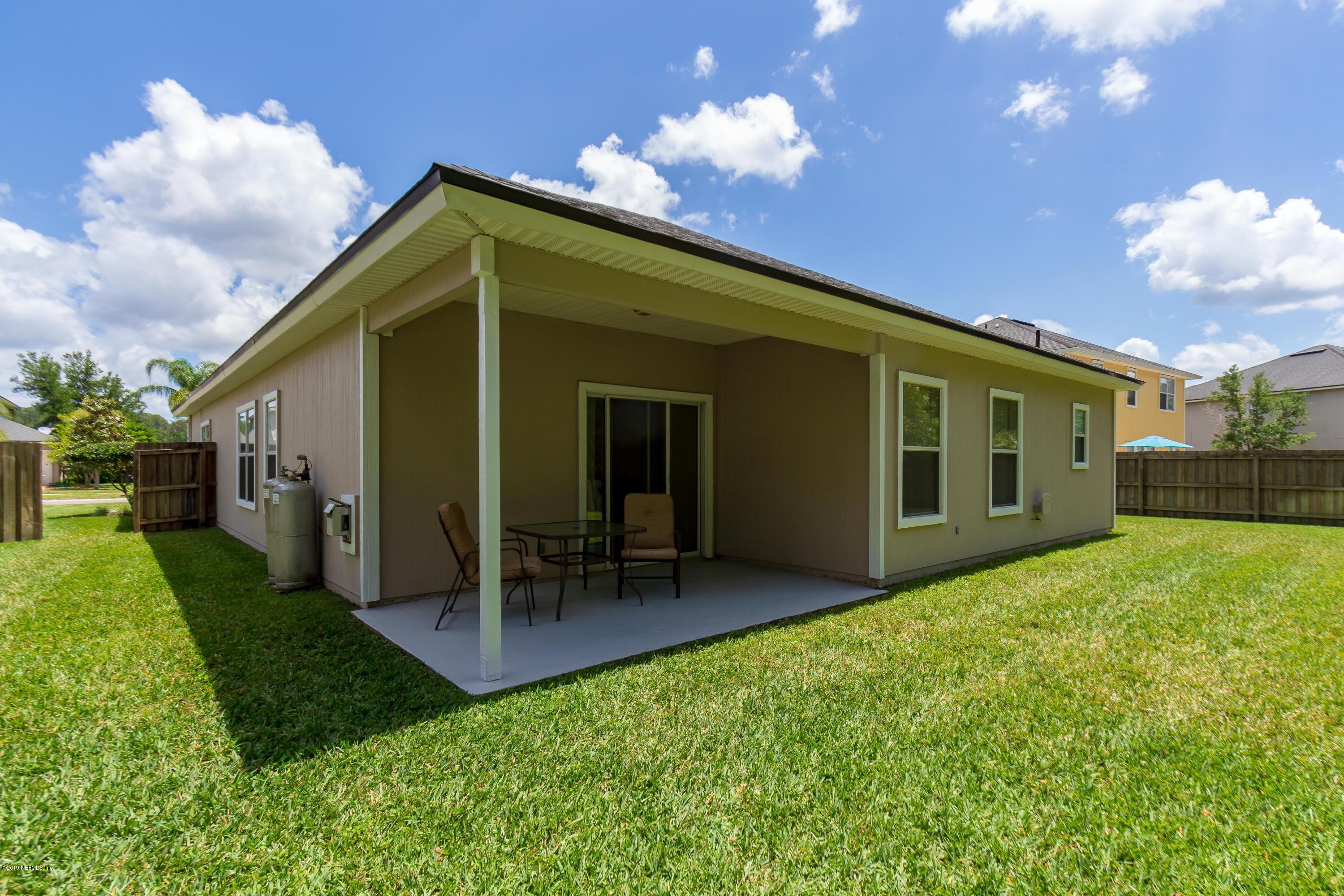 321 Stonehurst Parkway St. Augustine, FL 32092 - Photo 40 of 60 a view of a house with backyard