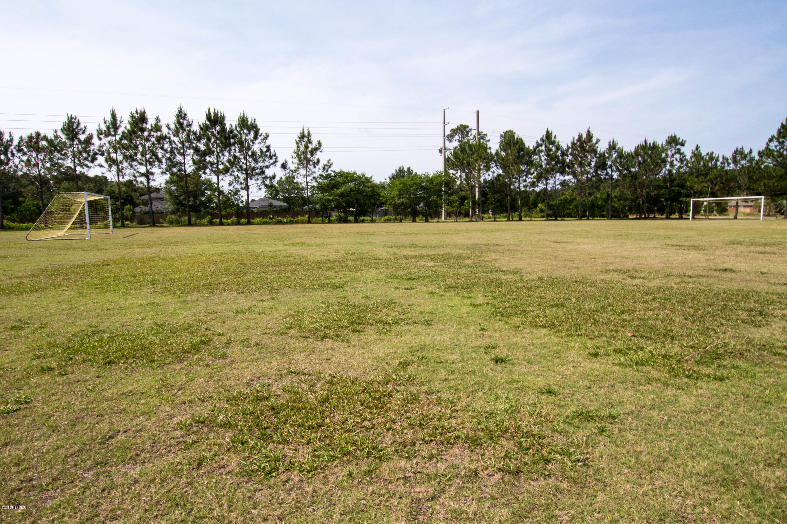 321 Stonehurst Parkway St. Augustine, FL 32092 - Photo 53 of 60 a view of a field with trees