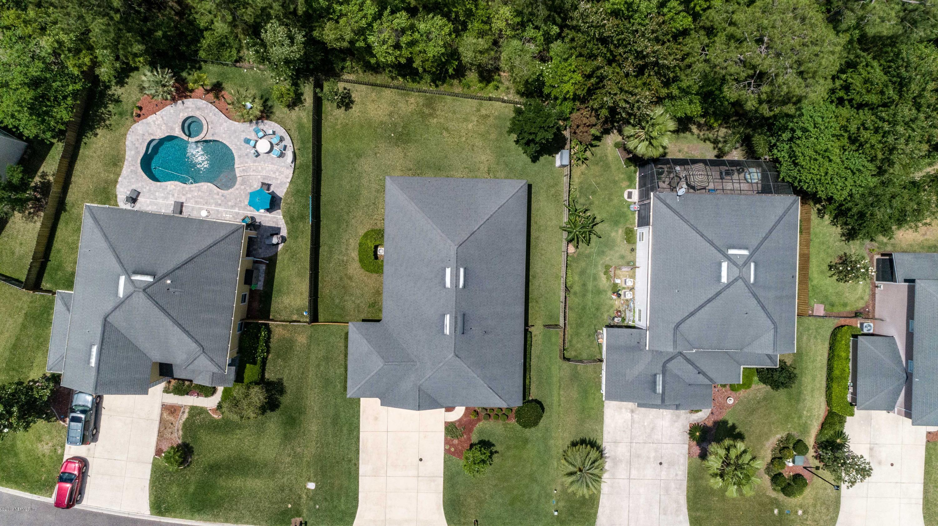 321 Stonehurst Parkway St. Augustine, FL 32092 - Photo 58 of 60 an aerial view of a house with outdoor space and a lake view