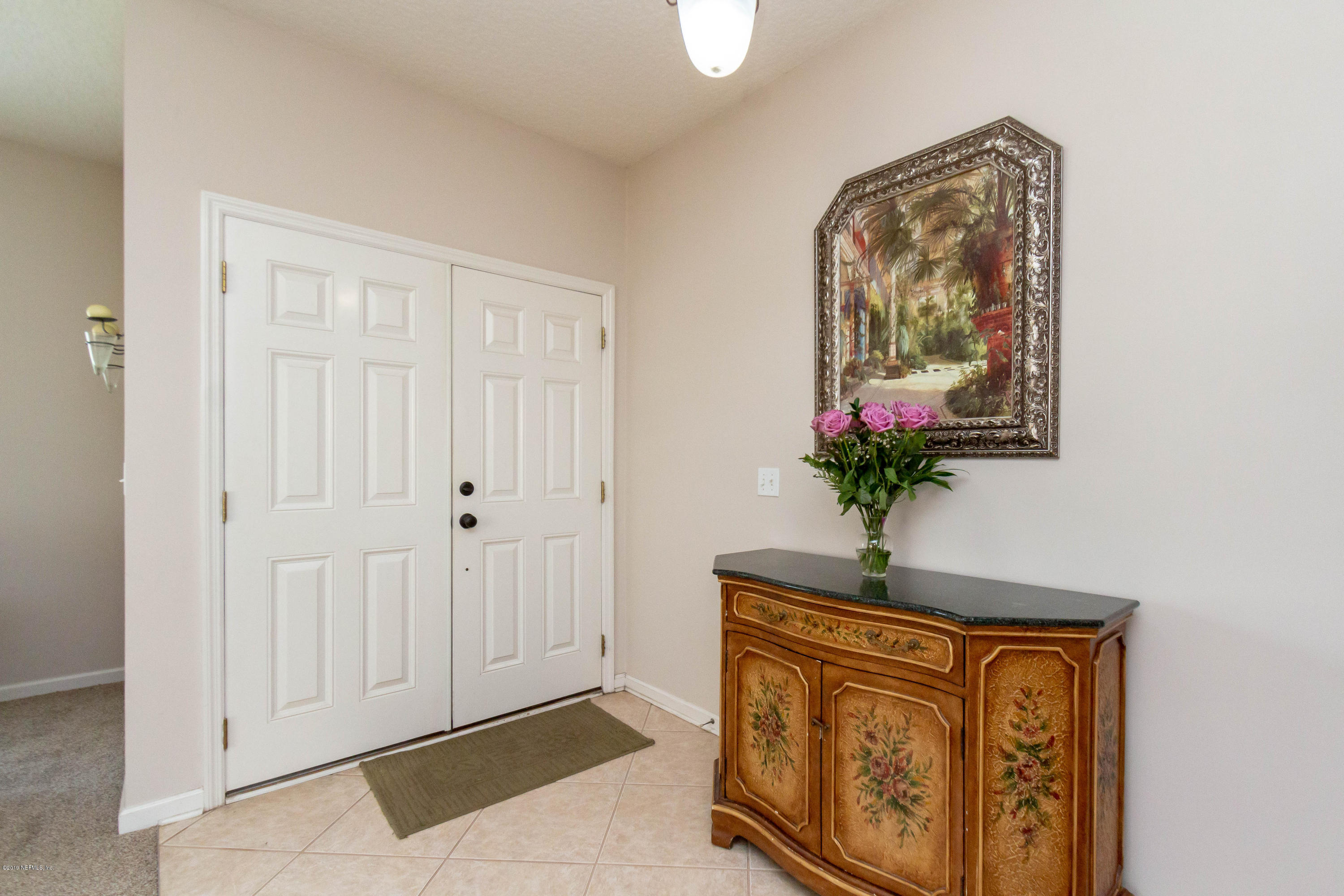 321 Stonehurst Parkway St. Augustine, FL 32092 - Photo 10 of 60 a view of front door with wooden floor