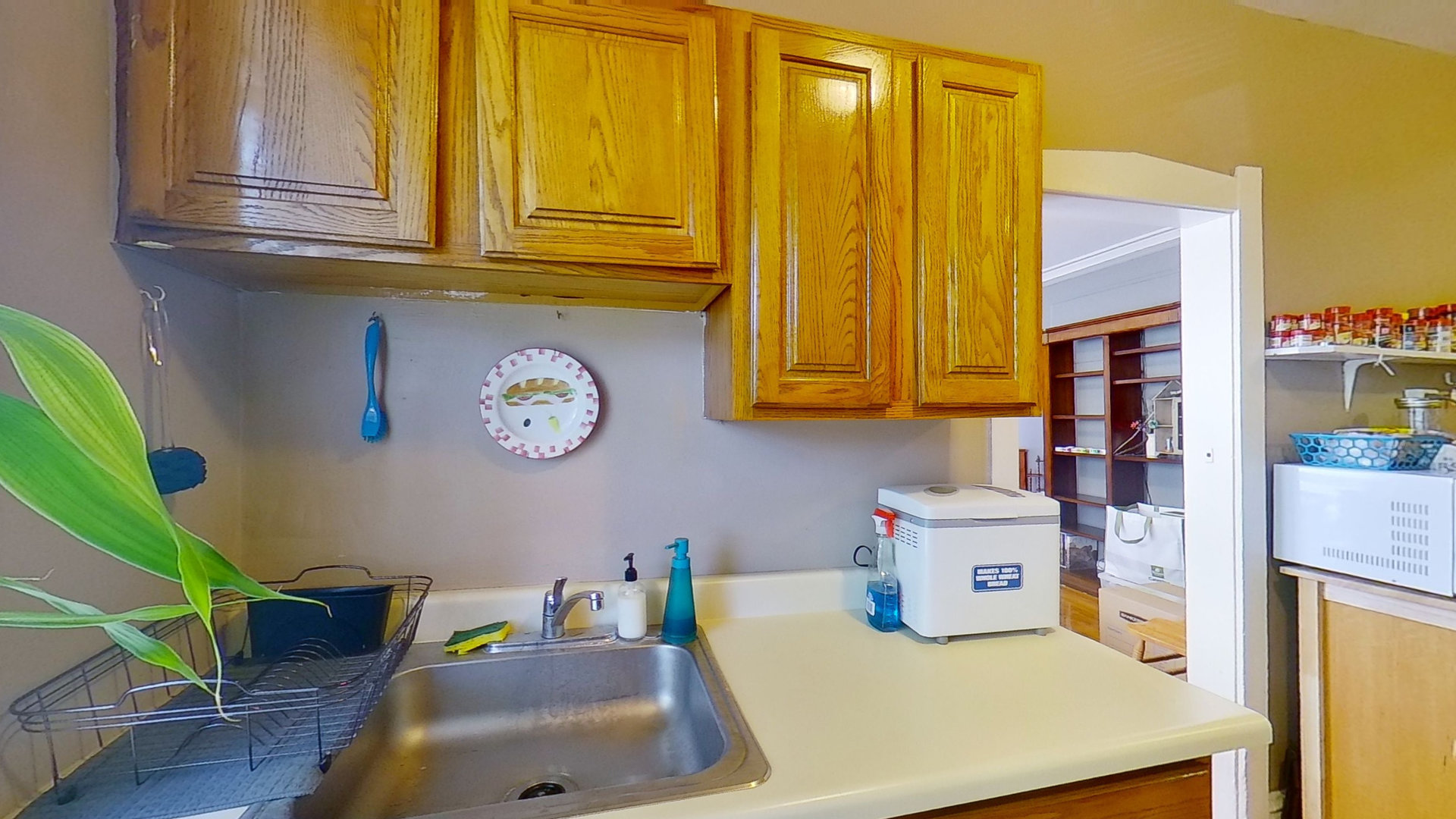 801 Monroe Street, Unit 1 Evanston, IL 60202 - Photo 11 of 24 a bathroom with a sink a washer and dryer