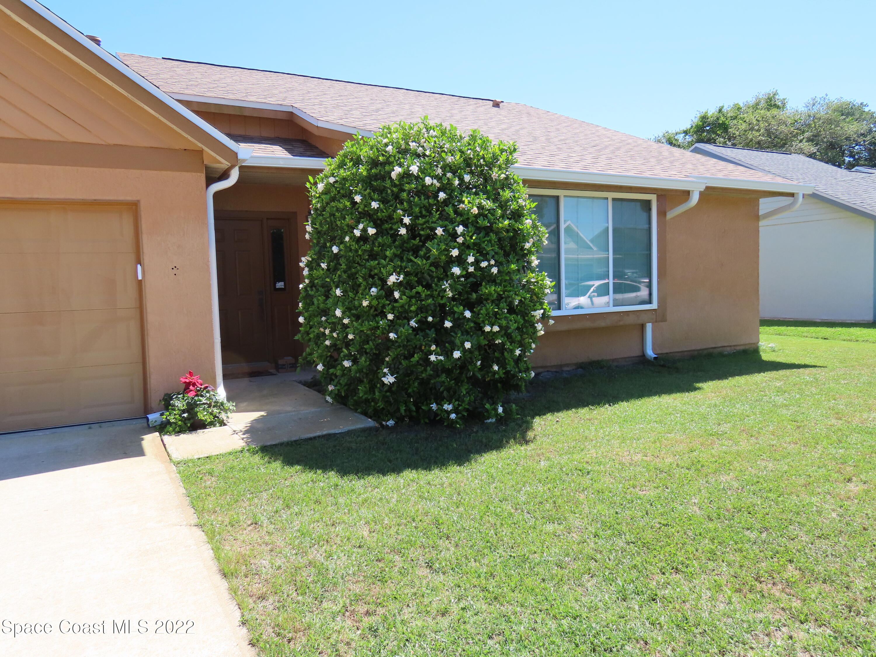 1233 Walnut Grove Way Rockledge, FL 32955 - Photo 19 of 19 a view of a house with a backyard
