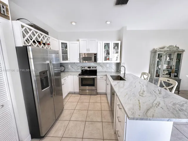 $598,000 | 4100 Fern Forest Road, Cooper City, FL 33026