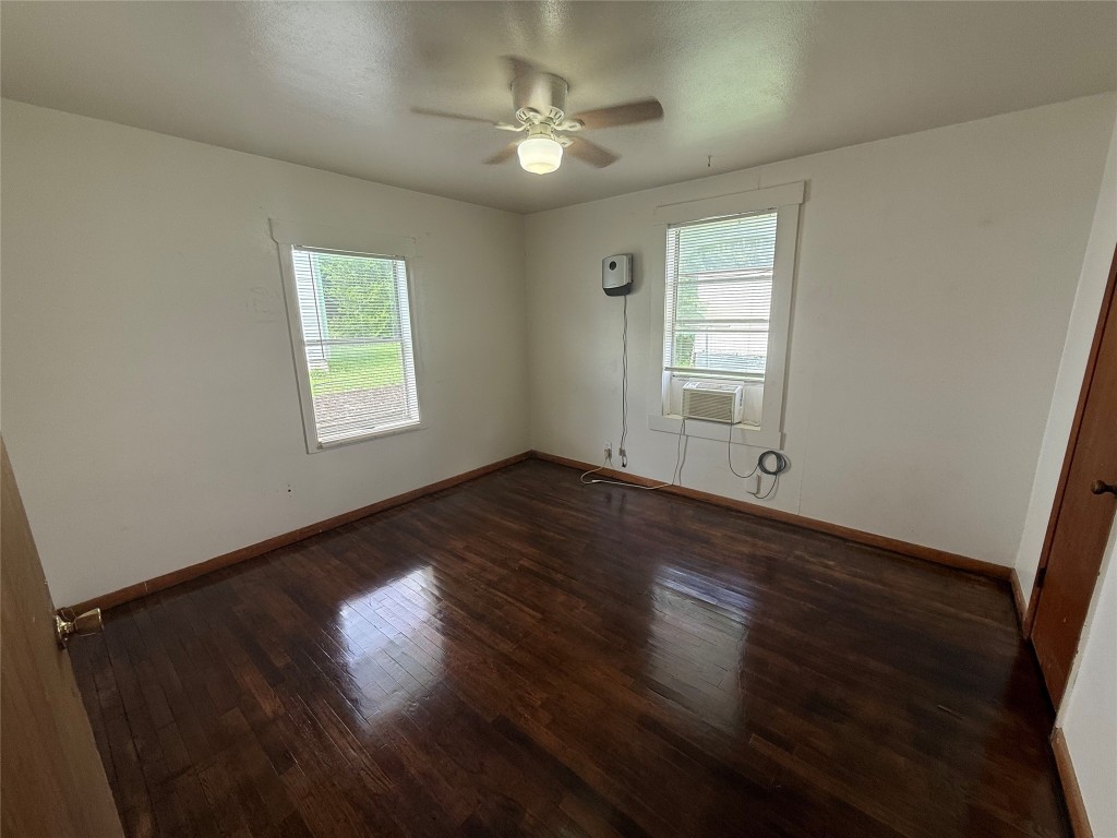 501 Houston Street Killeen, TX 76541 - Photo 11 of 11 a view of empty room with wooden floor and fan