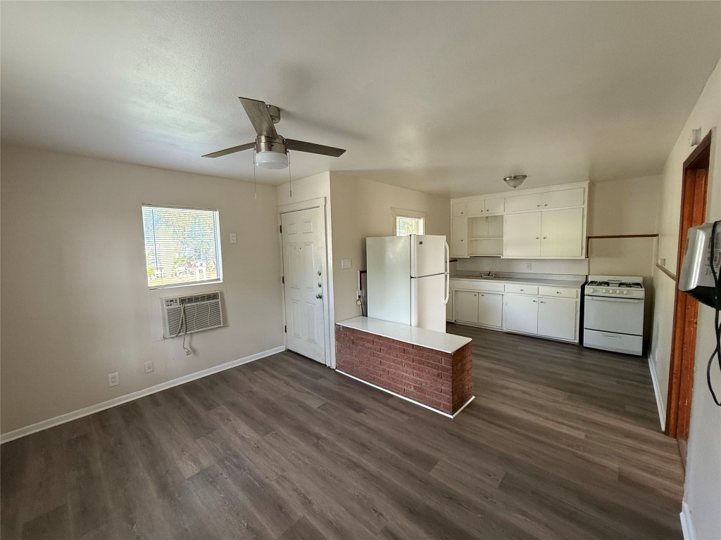 501 Houston Street Killeen, TX 76541 - Photo 6 of 11 a view of kitchen with wooden floor and electronic appliances