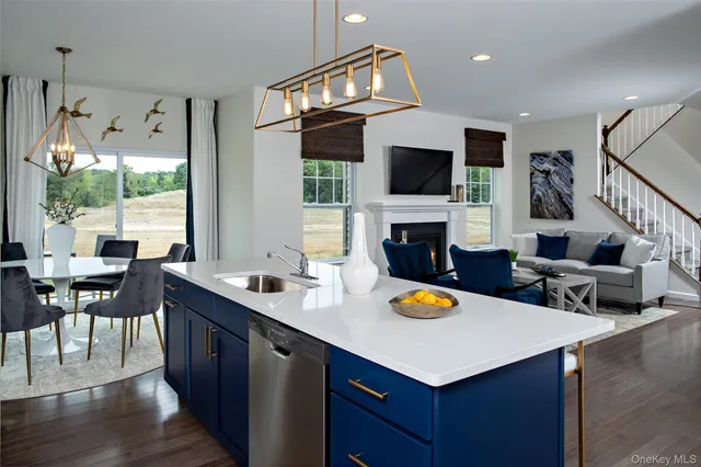 a bathroom with a sink and vanity