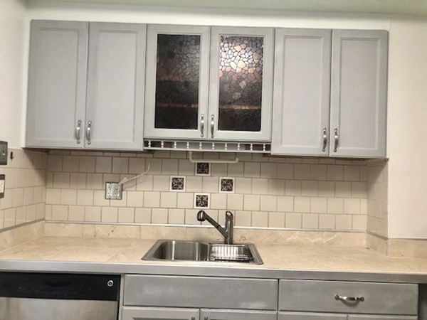 20 Bennett Street Beverly, MA 01915 - Photo 12 of 20 a bathroom with a sink and a window