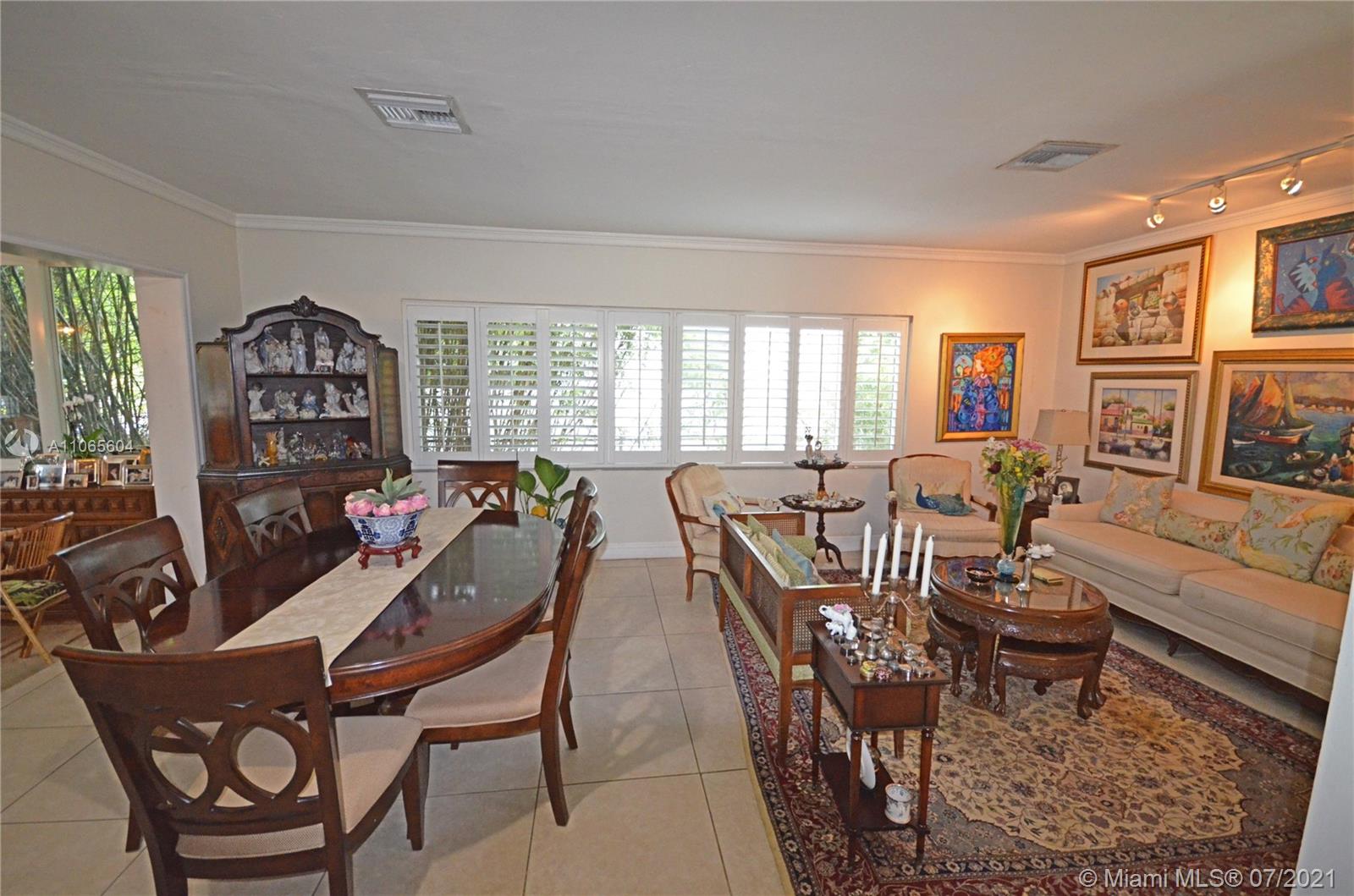 175 Southwest 24th Road Miami, FL 33129 - Photo 14 of 17 a view of a dining room with furniture window and outside view