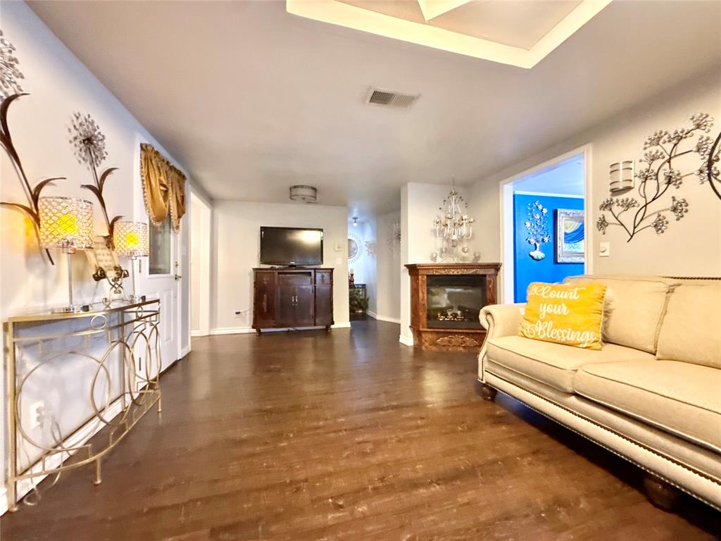 4216 Greenwood Road Weatherford, TX 76088 - Photo 4 of 26 Another view of living room showing fireplace