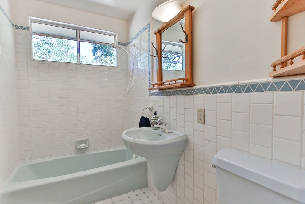 1833 White Oak Drive Alpine, CA 91901 - Photo 8 of 25 a bathroom with a sink a toilet and shower