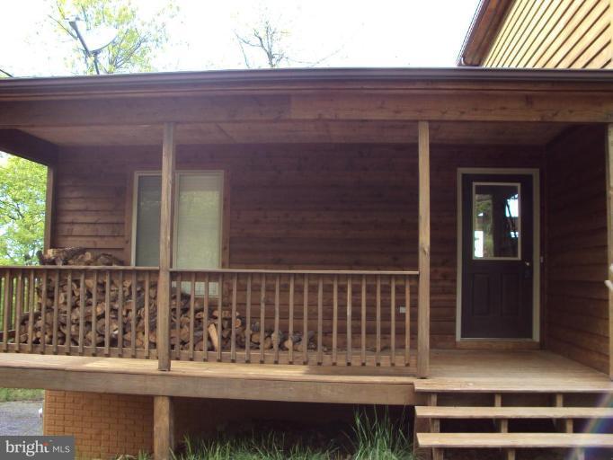 255 Mountain Top Road Front Royal, VA 22630 - Photo 2 of 30 a view of wooden balcony