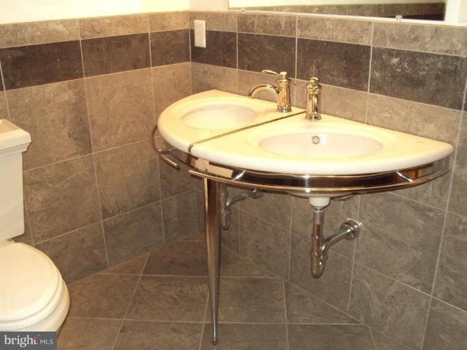 255 Mountain Top Road Front Royal, VA 22630 - Photo 18 of 30 a bathroom with a sink and toilet