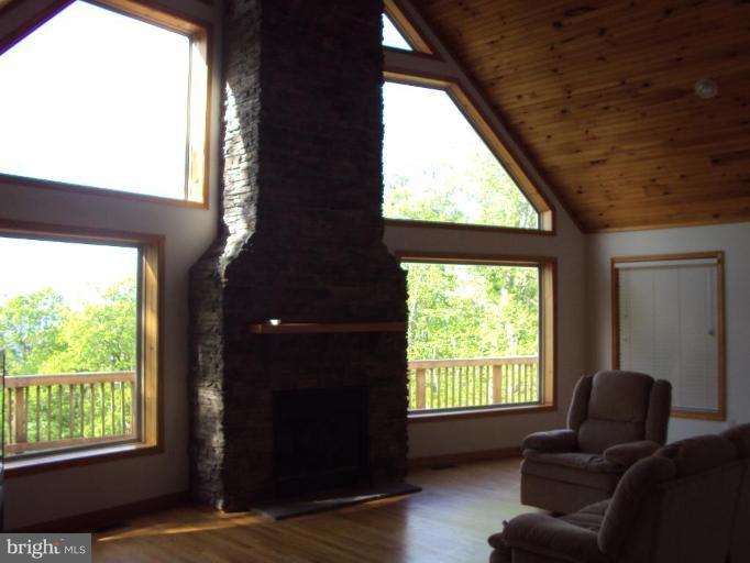255 Mountain Top Road Front Royal, VA 22630 - Photo 10 of 30 a living room with furniture and a window