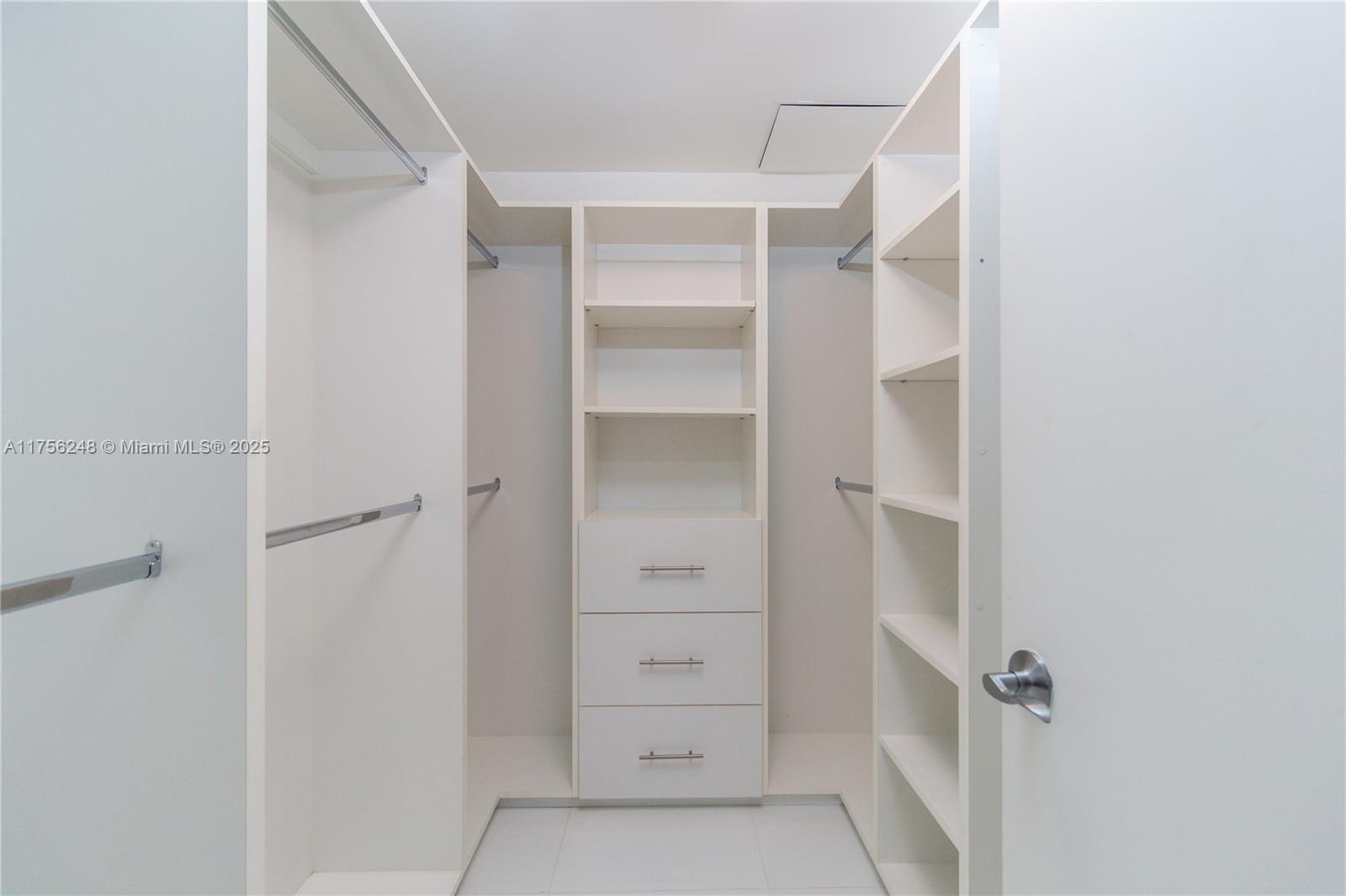 253 Northeast 2nd Street, Unit 3702 Miami, FL 33132 - Photo 18 of 25 a view of a walk in closet