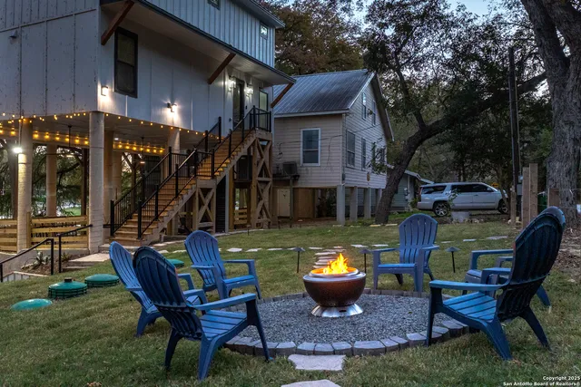 a view of an outdoor sitting area in a yard