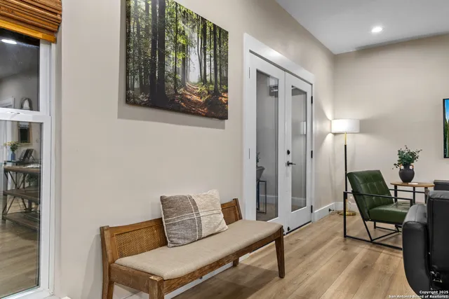 a living room with furniture and a window