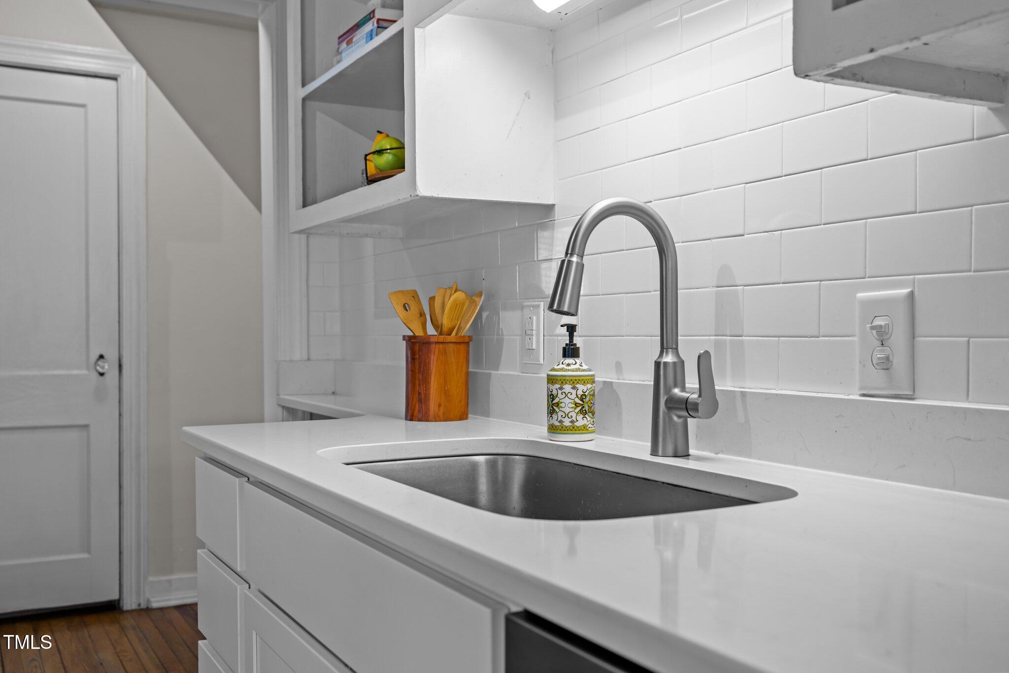 2511 State Street Durham, NC 27704 - Photo 10 of 45 a close view of sink and tap